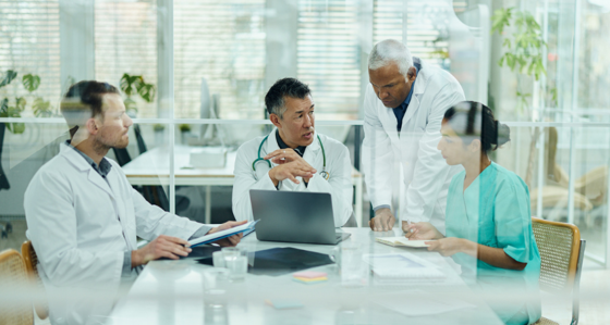 Lab workers in a meeting