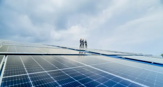 solar workers on solar panels