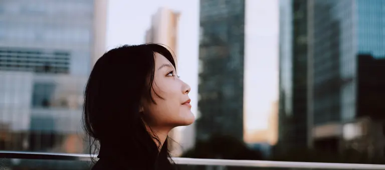 Confident Asian businesswoman in financial district