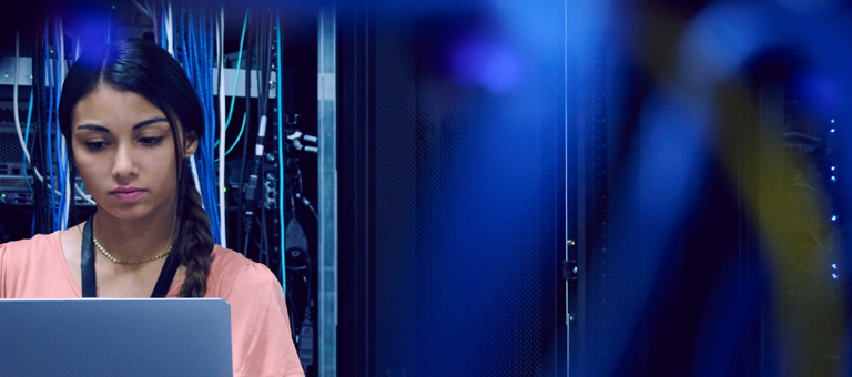 Young woman working in a data centre