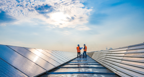 Workers on solar panels