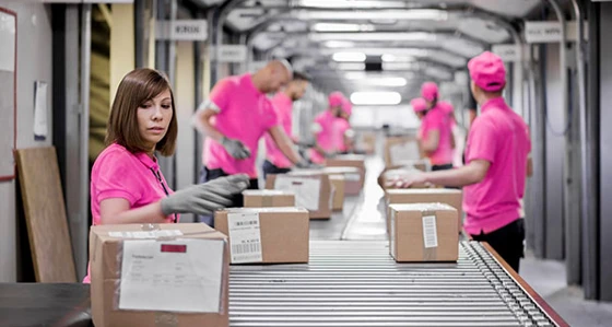 Workers in a logistics facility