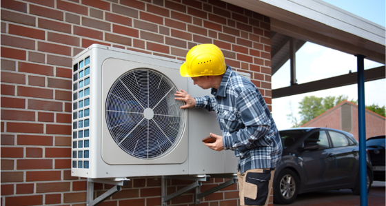 Engineer inspecting an air pump