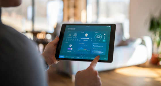 Person handling a tablet with data