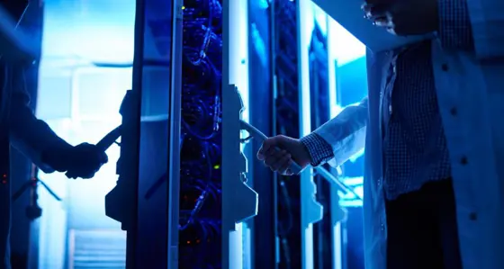 Man opening a unit in a data centre