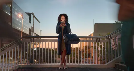 Woman outside on her mobile phone