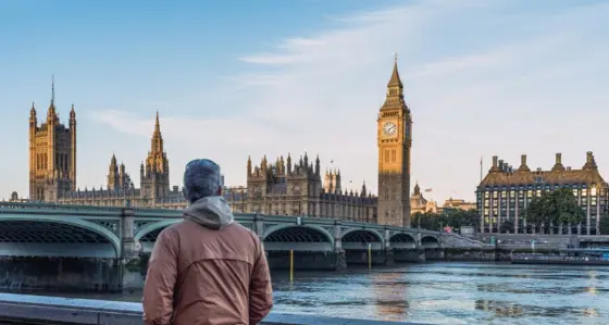 Man in front of Government buildings