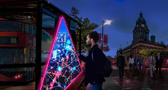 Man using a triangle portal in a city centre road