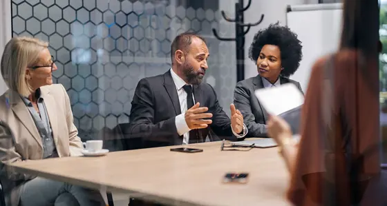 Boardroom meeting with diverse executives