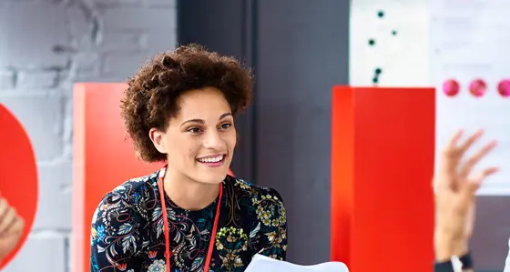 A group of people in a meeting