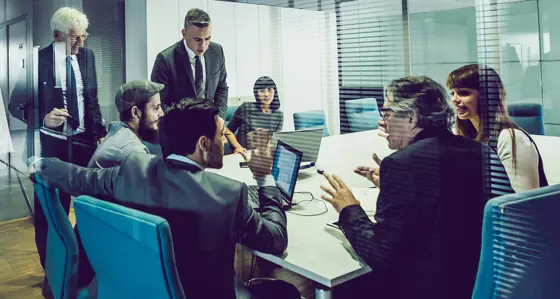 A group of professionals having a meeting
